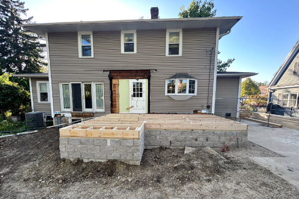 renovated house in Glenview with white door and roof