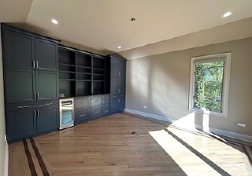 kitchen remodel with large window and hardwood floor in Des Plaines, IL